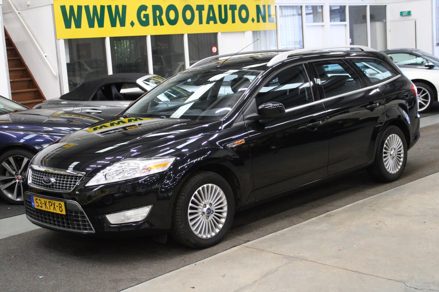 Ford Mondeo Wagon - 2.0-16V Titanium FlexiFuel NAP, Airco, Navi, Isofix, Trekhaak - AutoWereld.nl