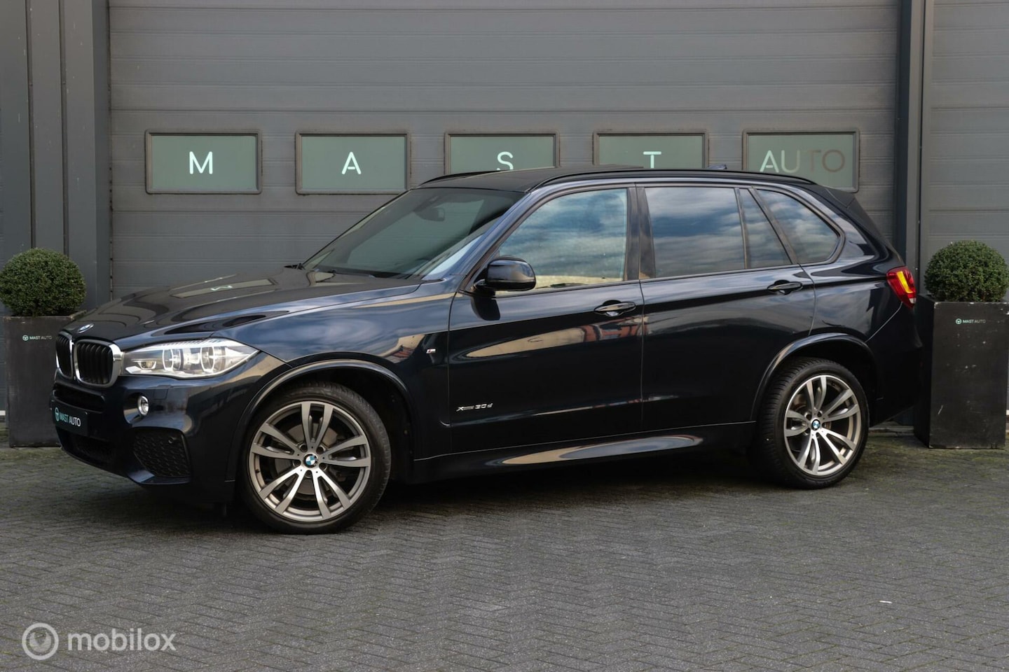 BMW X5 - xDrive30d High Exe M-Sport|Pano|HUD|Trekhaak| - AutoWereld.nl