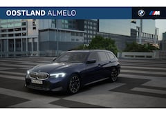 BMW 3-serie Touring - 330e High Executive M Sport Automaat / Panoramadak / Sportstoelen / Adaptieve LED / Comfor