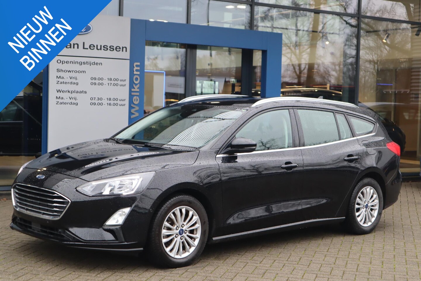 Ford Focus Wagon - 125PK HYBRID TITANIUM APPLE/ANDROID CAMERA P-SENSOREN KEYLESS BLISS WINTERPACK ALL-SEASON - AutoWereld.nl