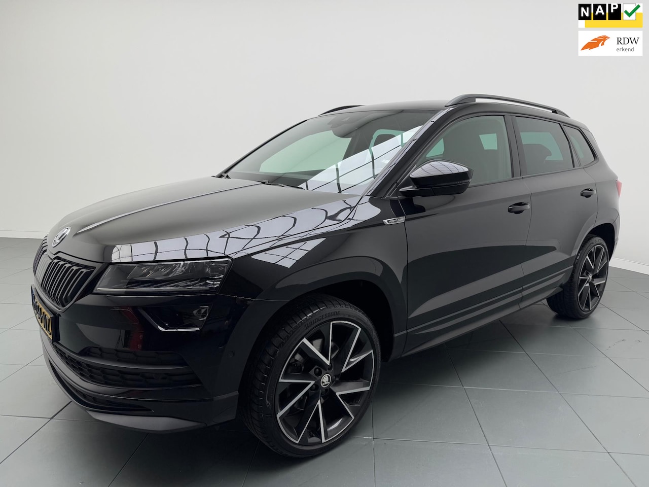 Skoda Karoq - 1.5 TSI ACT Sportline Business 150 Pk Aut. Airco Navi Xenon Camera 142 dkm Nao 1e Eig. - AutoWereld.nl