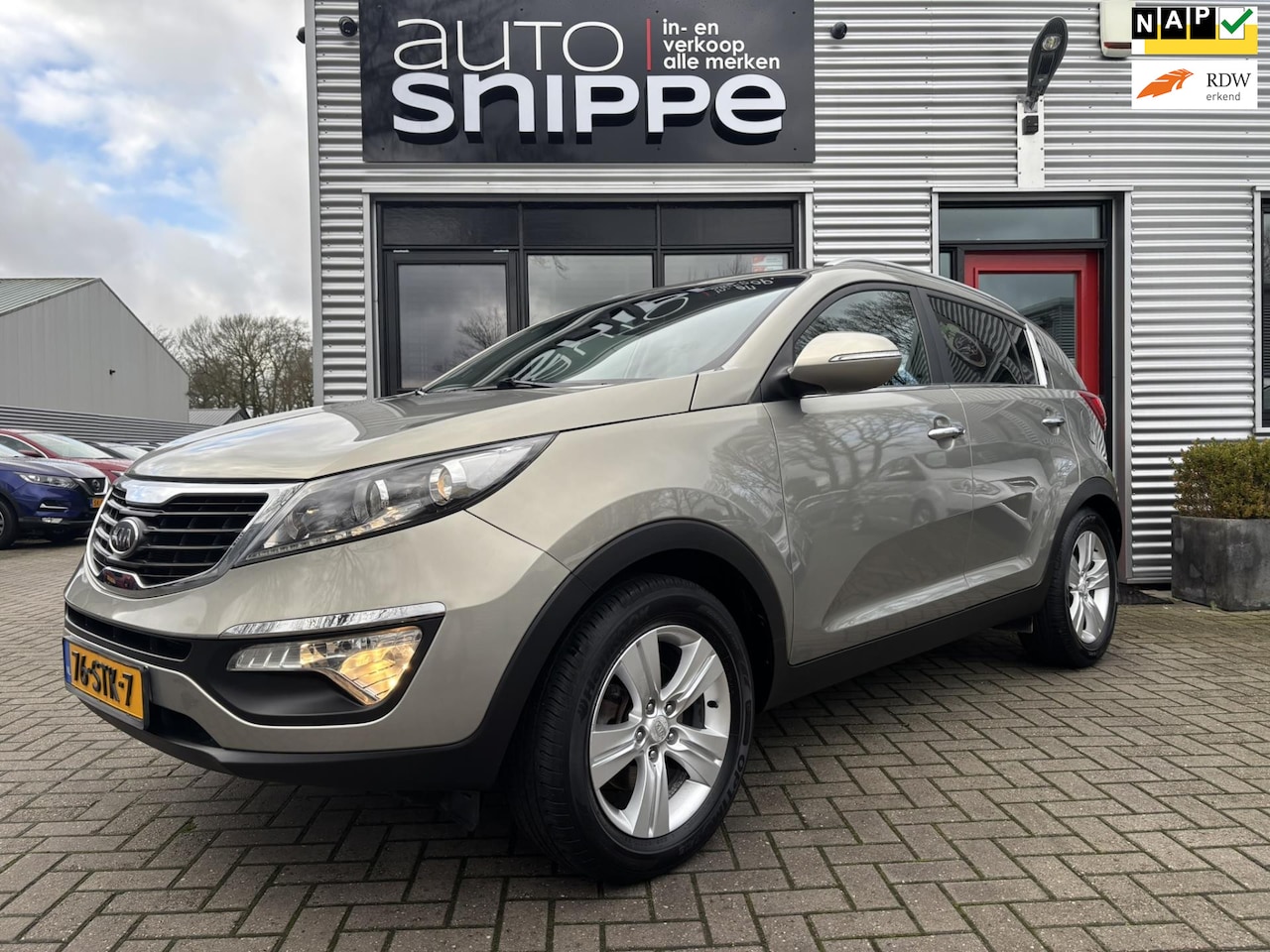 Kia Sportage - 2.0 X-ecutive Plus Pack -AUTOMAAT-CLIMA-CRUISECONTROL-TREKHAAK-1600 KG TREKGEWICHT-NAVI-BL - AutoWereld.nl