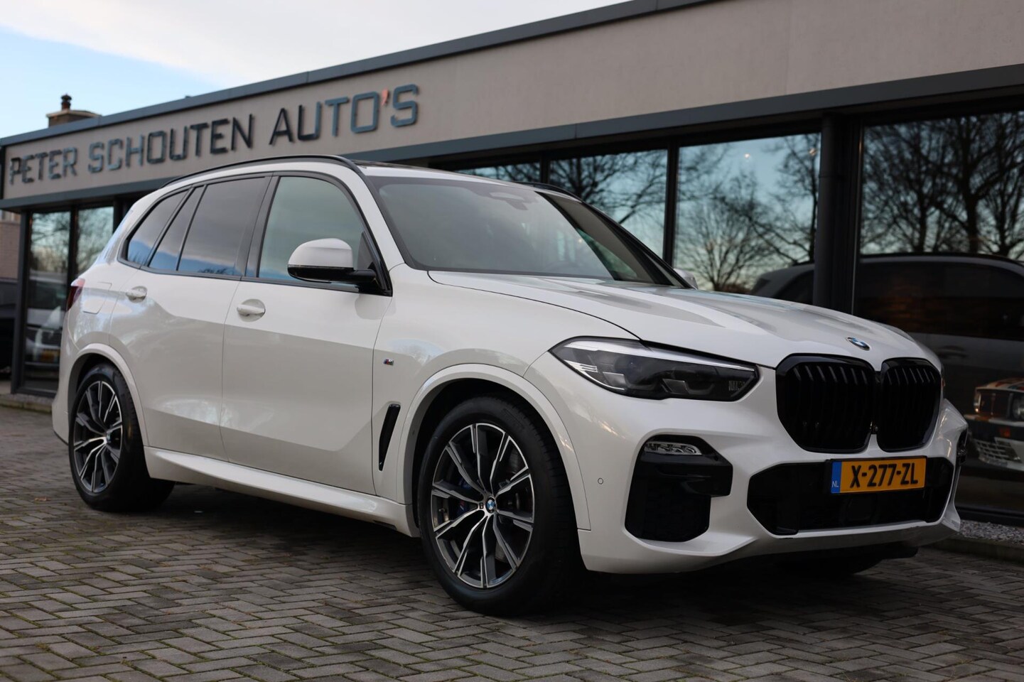 BMW X5 - XDrive45e M-Pakket High Executive | Pano | Luchtvering | El. Trekhaak | 360 Camera | - AutoWereld.nl