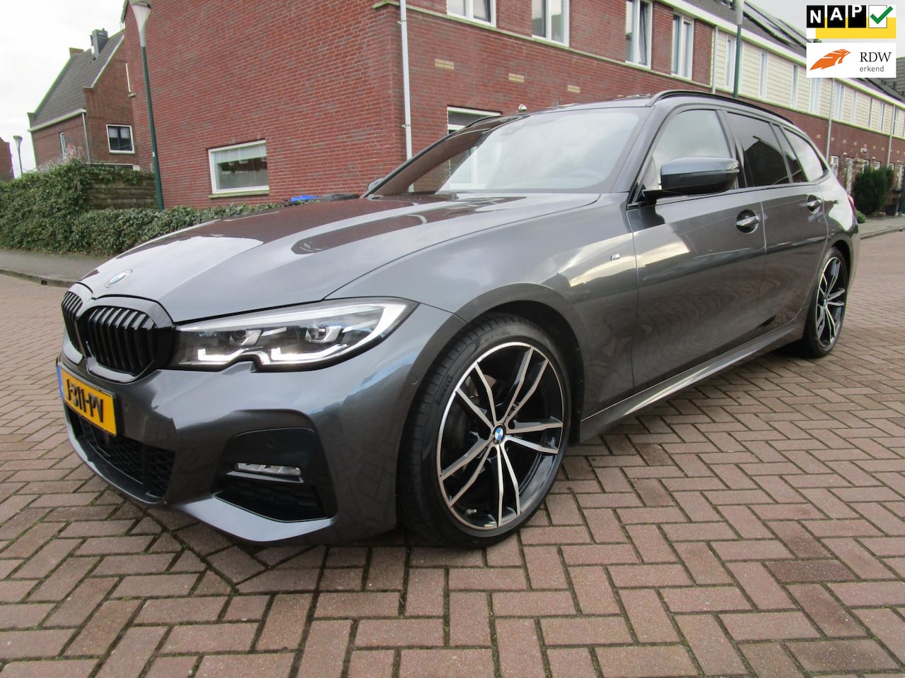 BMW 3-serie Touring - 320d HighExecutive Msport volopties pano - AutoWereld.nl