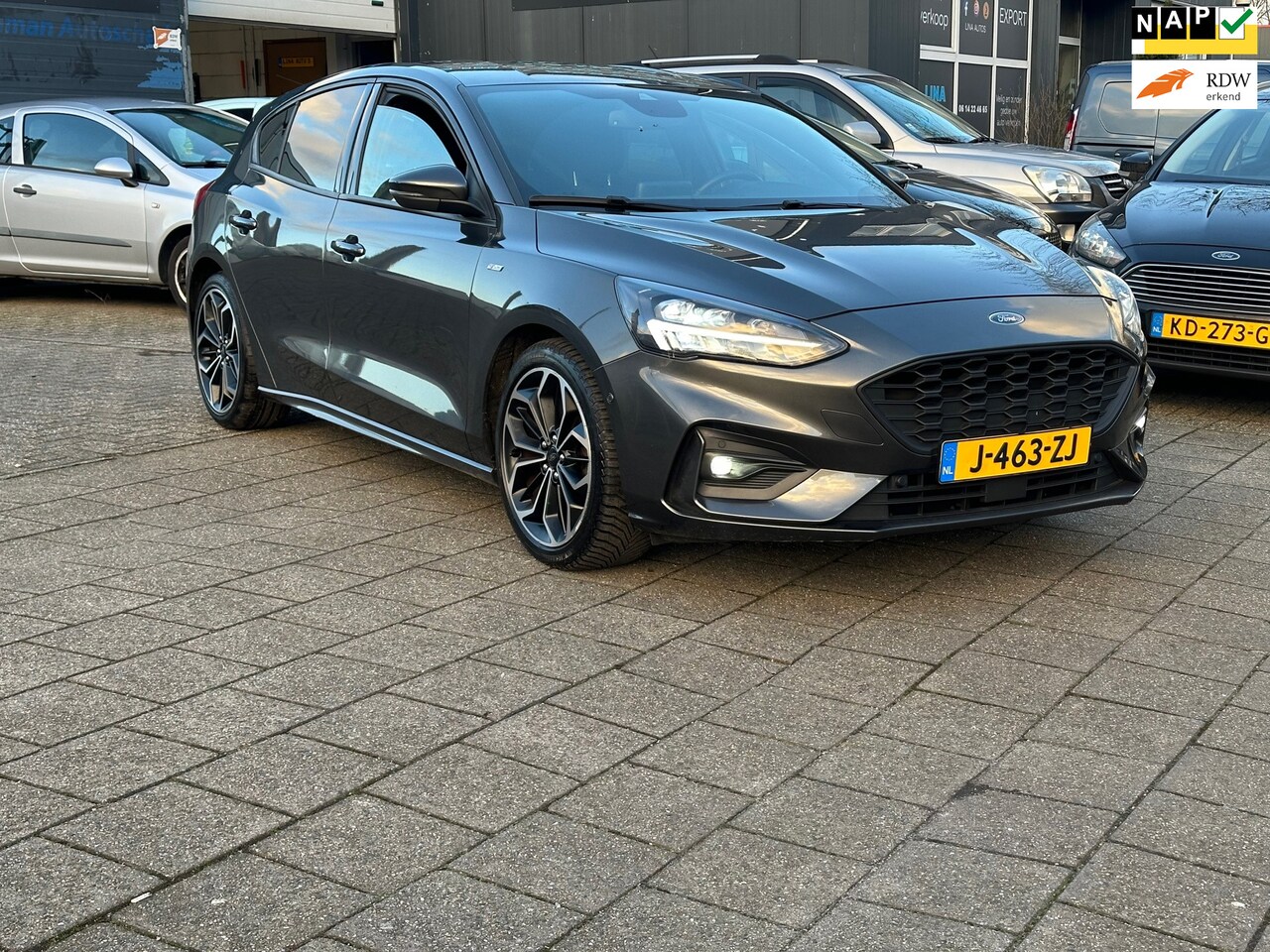 Ford Focus - 1.0 EcoBoost Titanium Business |AUTOMAAT | zelf in parkeren| nette auto | voll | lage kmst - AutoWereld.nl