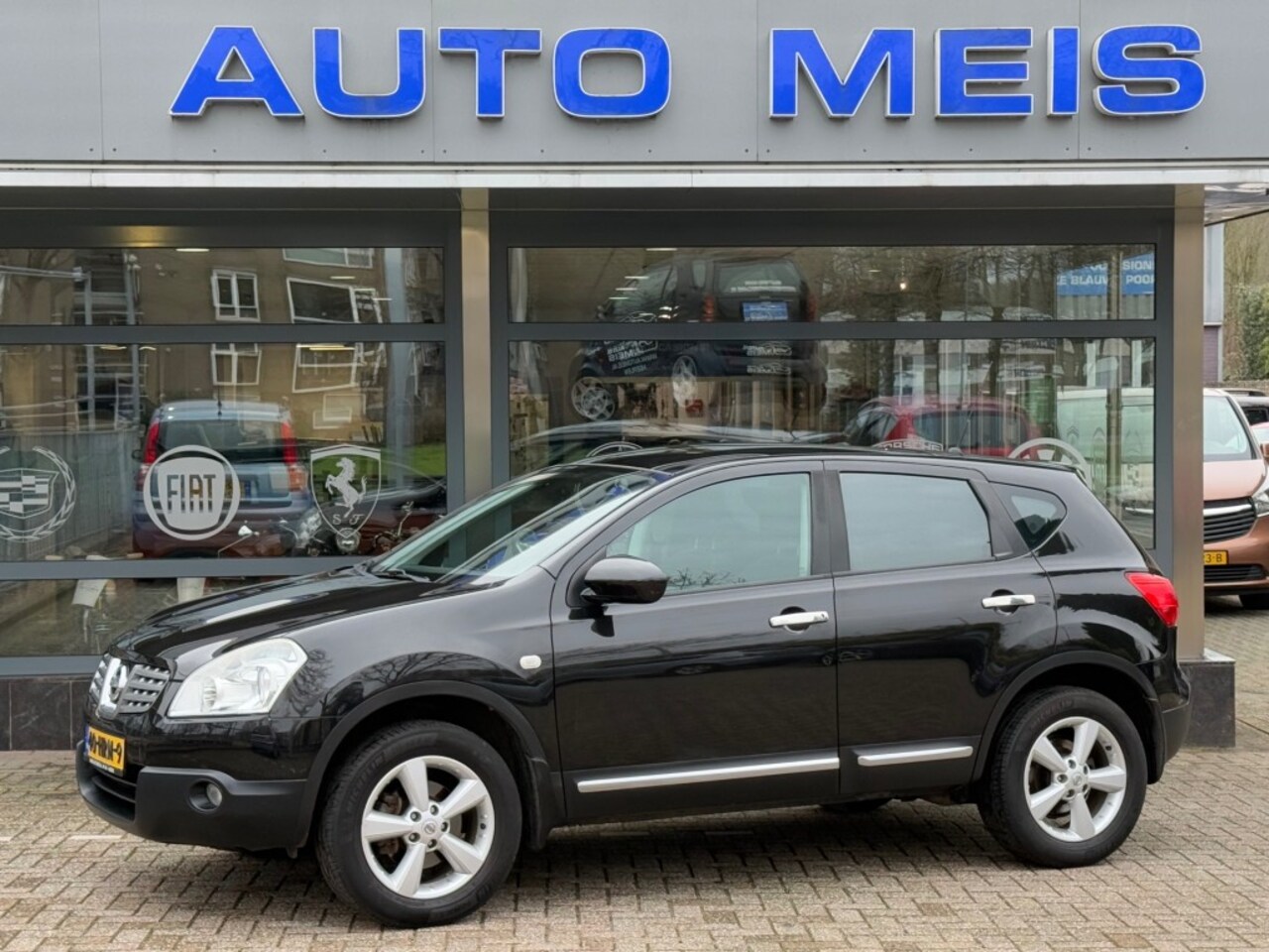 Nissan Qashqai - 2.0 Acenta Panoramadak Navi Clima Cruise PDC Trekhaak - AutoWereld.nl