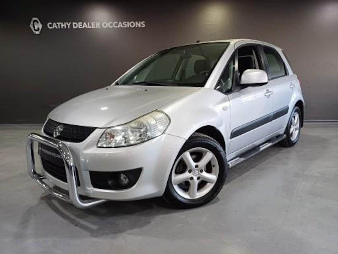 Suzuki SX4 - 1.6 Exclusive Climate Trekhaak Bull+Sidebars LM-Velgen - AutoWereld.nl