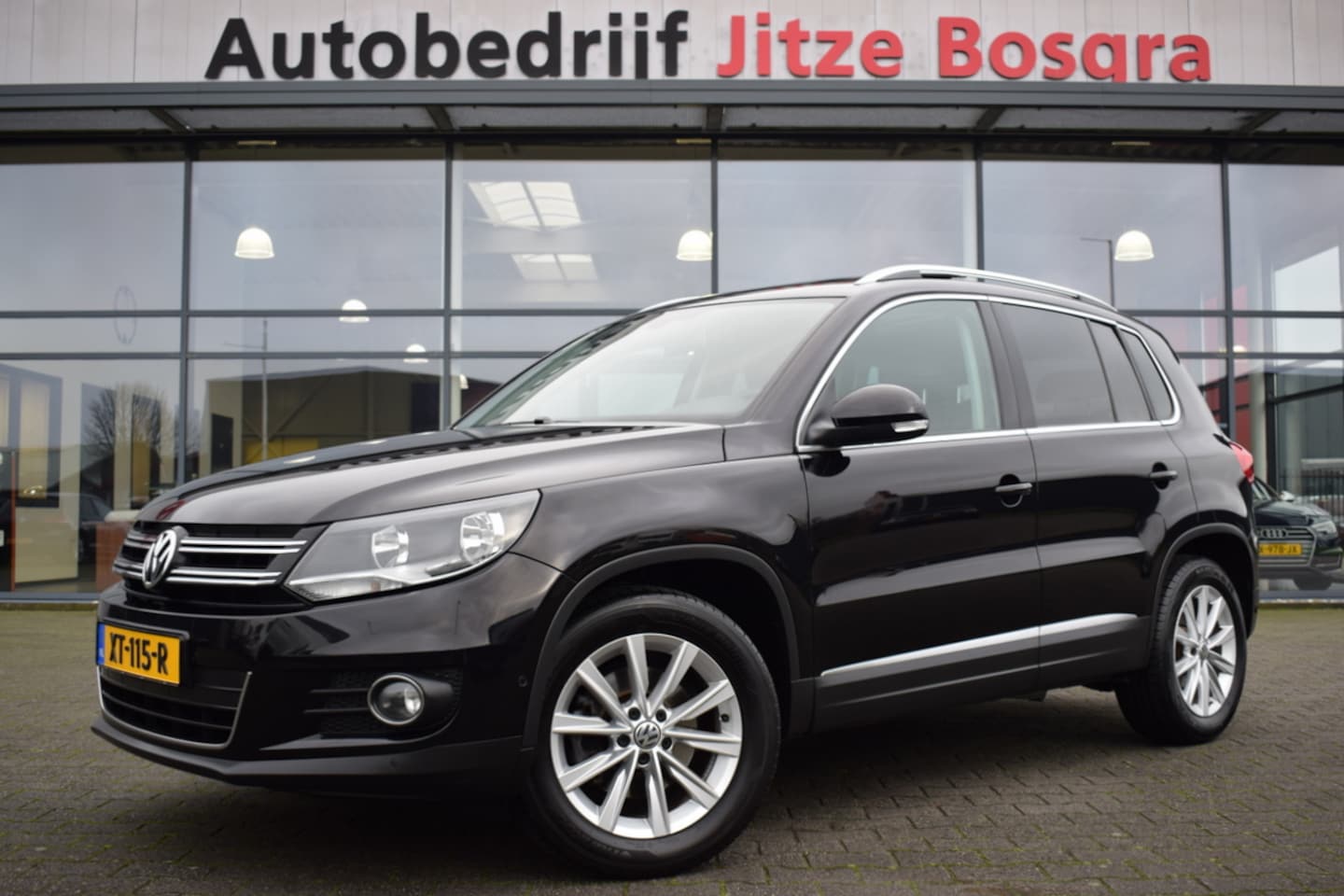 Volkswagen Tiguan - 1.4 TSi Sport&Style Panoramadak | Carplay | 17 Inch LMV | ECC | Trekhaak - AutoWereld.nl