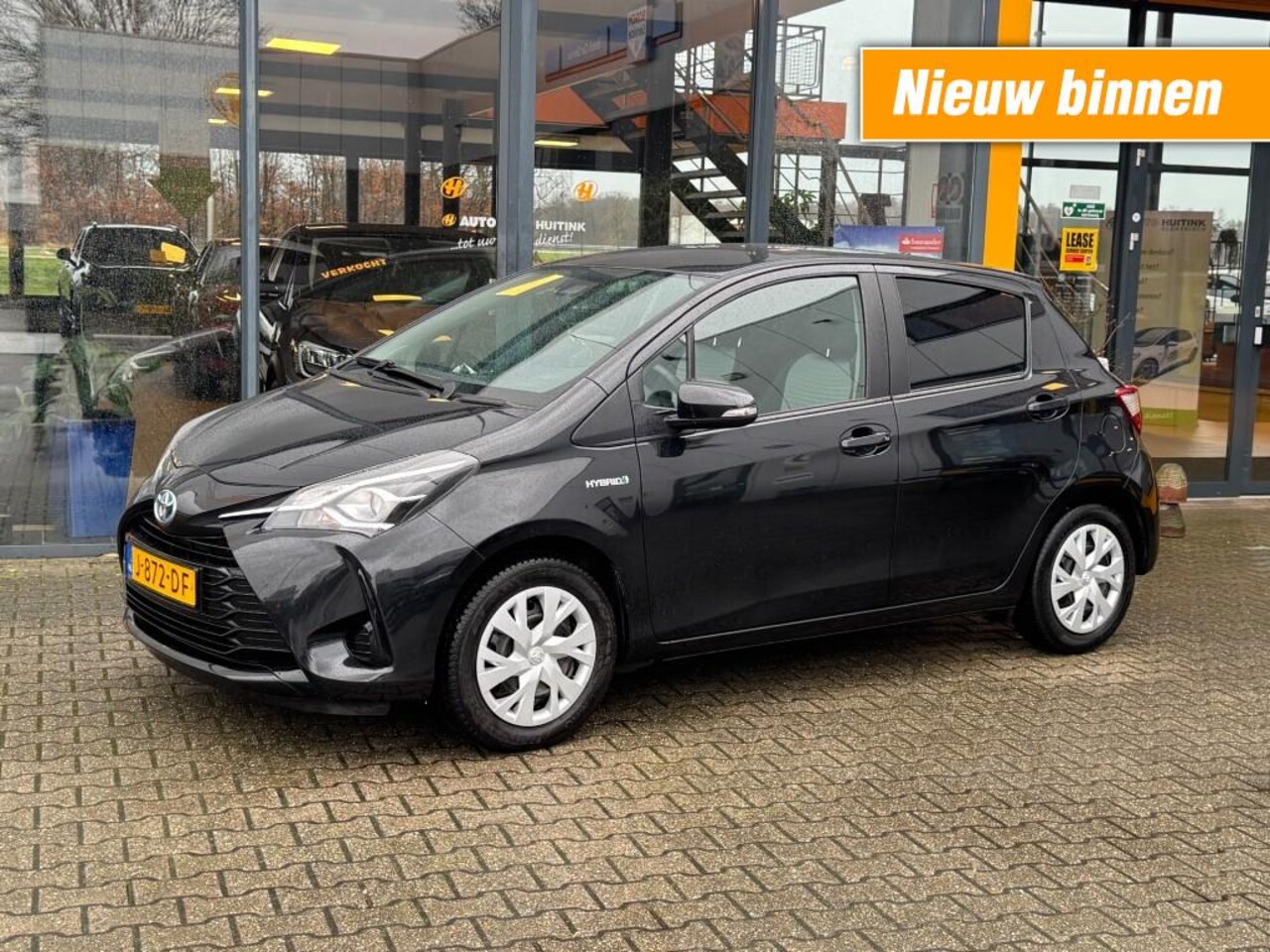 Toyota Yaris - 1.5 Hybride Active - navi - camera - climate control - AutoWereld.nl