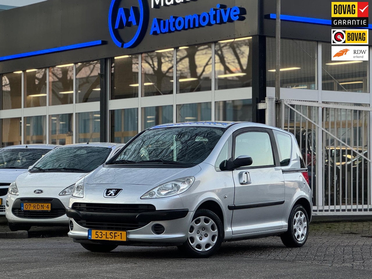 Peugeot 1007 - 1.4 Urban Lage KM Boekjes Elektrische zijschuifdeuren | 3 sleutels - AutoWereld.nl