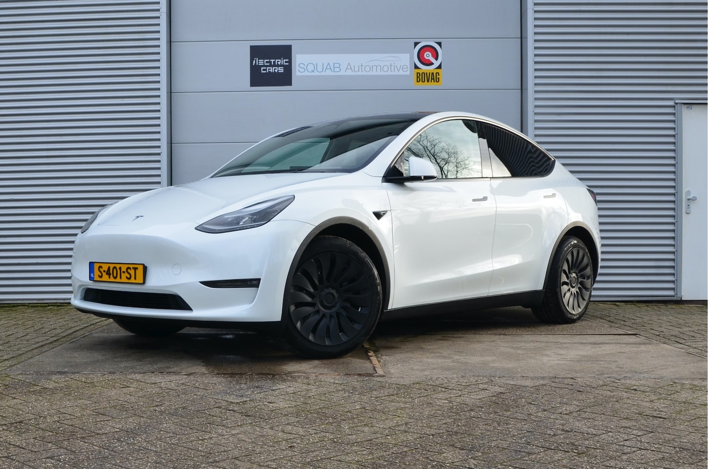 Tesla Model Y - Long Range AWD 75 kWh AutoPilot, Trekhaak (1.600kg), incl. BTW - AutoWereld.nl