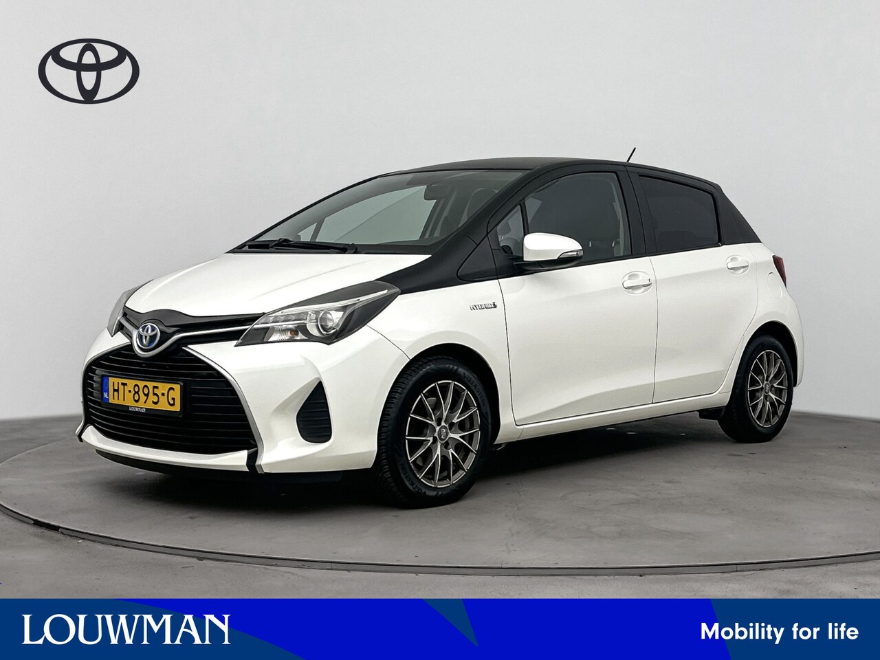 Toyota Yaris - 1.5 Hybrid Aspiration Bi-Tone | Navigatie | Leder | Climate Control | Cruise Control | LM - AutoWereld.nl