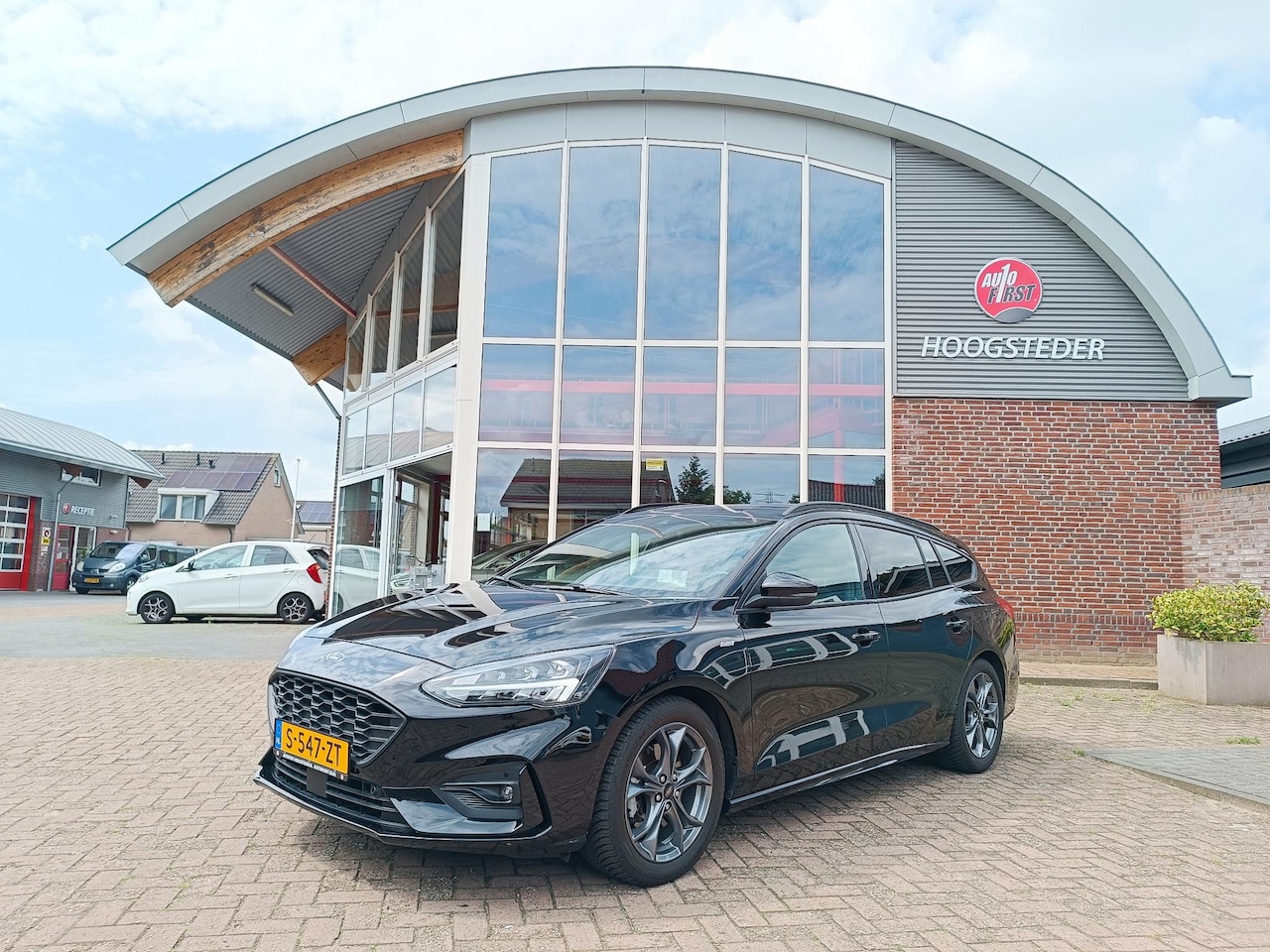 Ford Focus Wagon - 1.0 EcoBoost ST-Line, Camera, HUD, Cruise control - AutoWereld.nl