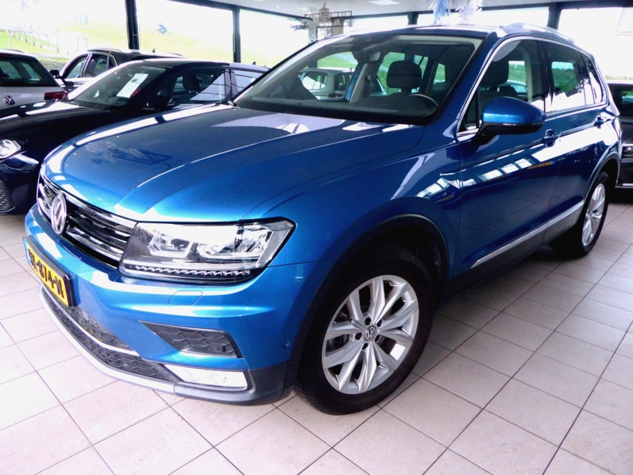 Volkswagen Tiguan - 2.0 TSI 4M. Highline - AutoWereld.nl