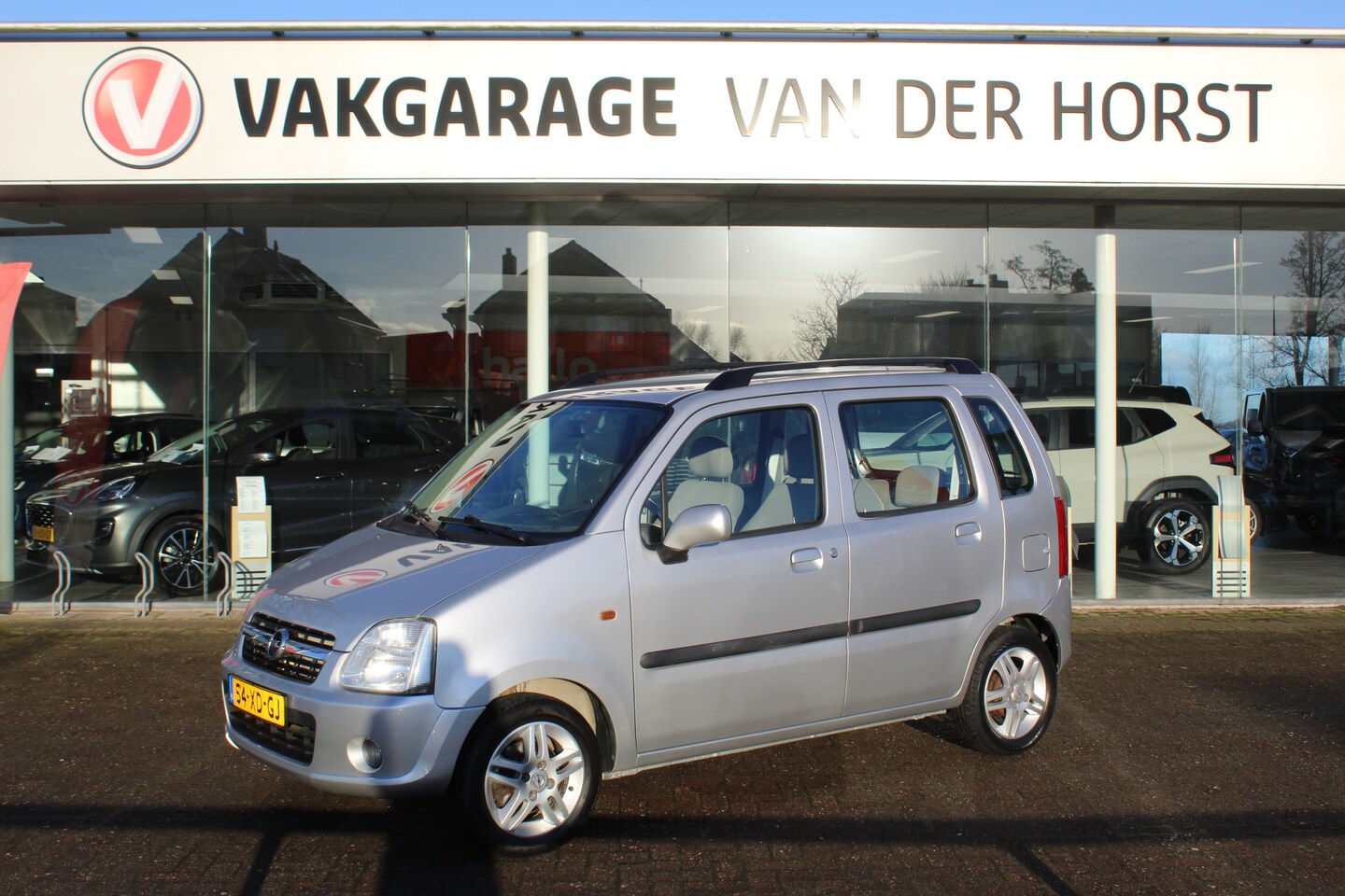 Opel Agila - 1.2-80pk 16V Maxx. , Hoge zit slechts 70911km NAP Airco , Radio/CD , LM velgen , Mistlampe - AutoWereld.nl