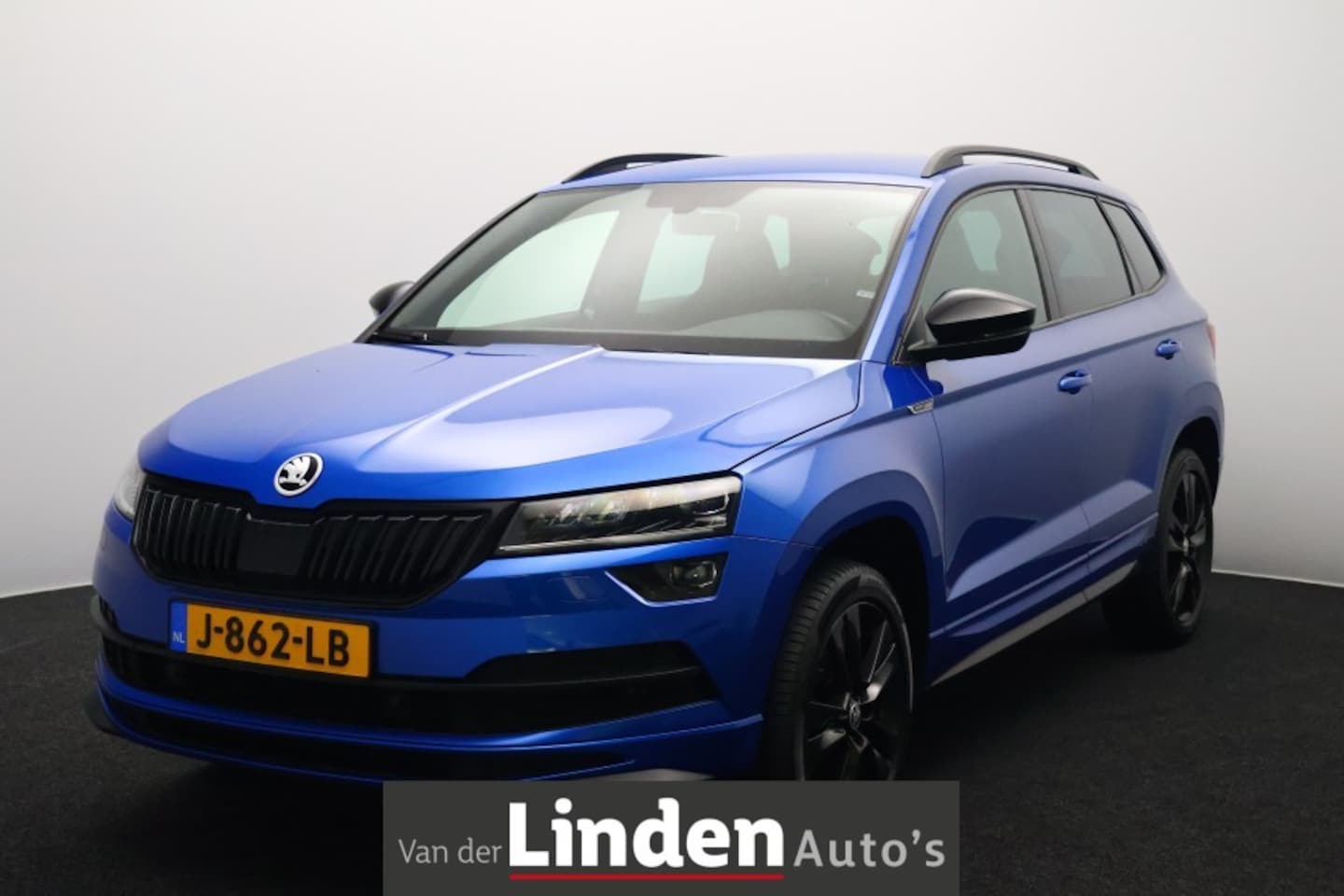 Skoda Karoq - 1.5 TSI ACT Sportline Business | Navigatie | Led | Camera | Parkeerhulp | Clima - AutoWereld.nl