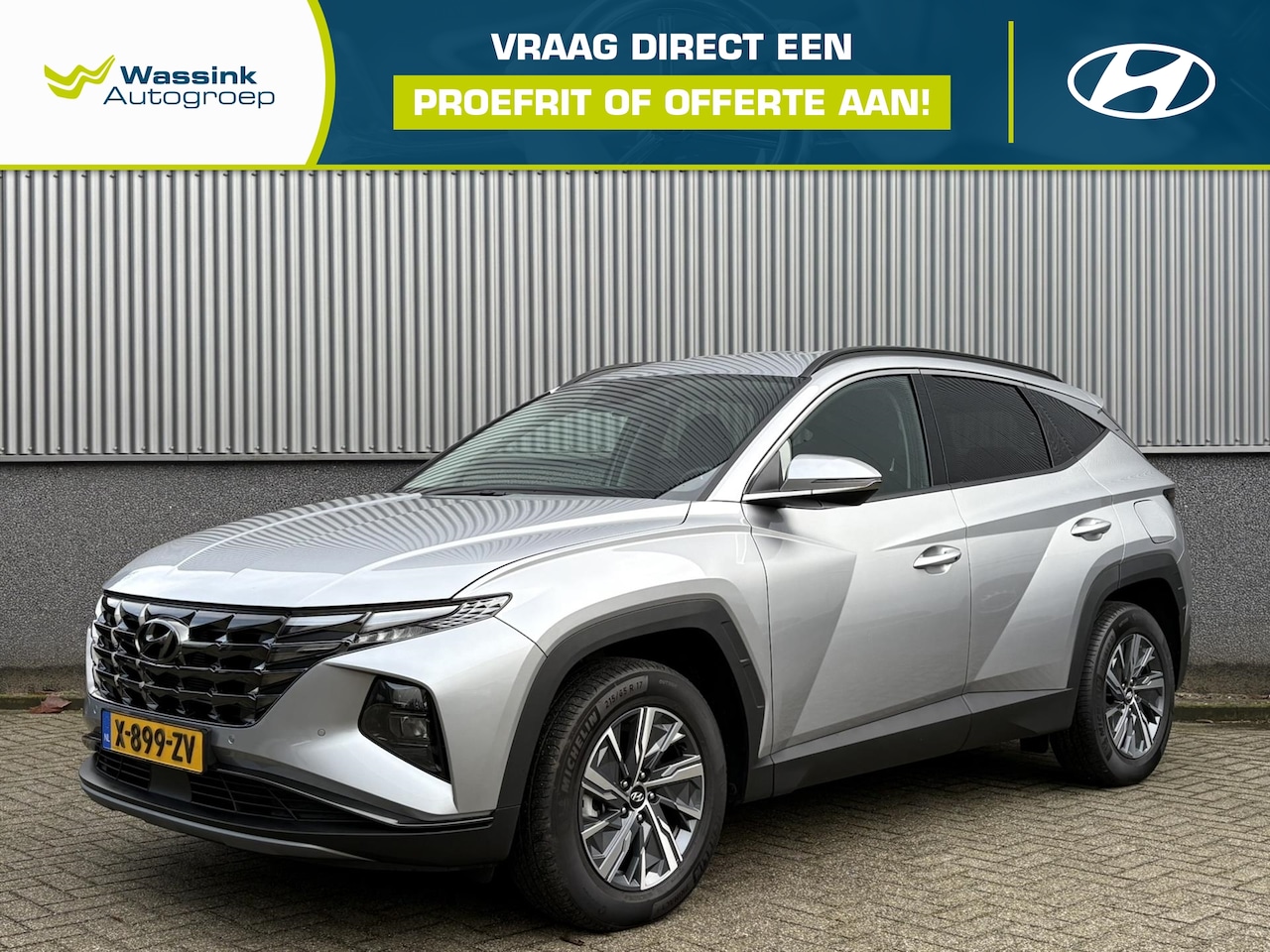 Hyundai Tucson - 1.6 HEV 230pk Comfort Smart | Automaat | Navigatie | Elektrische Achterklep | 1.650kg Trek - AutoWereld.nl