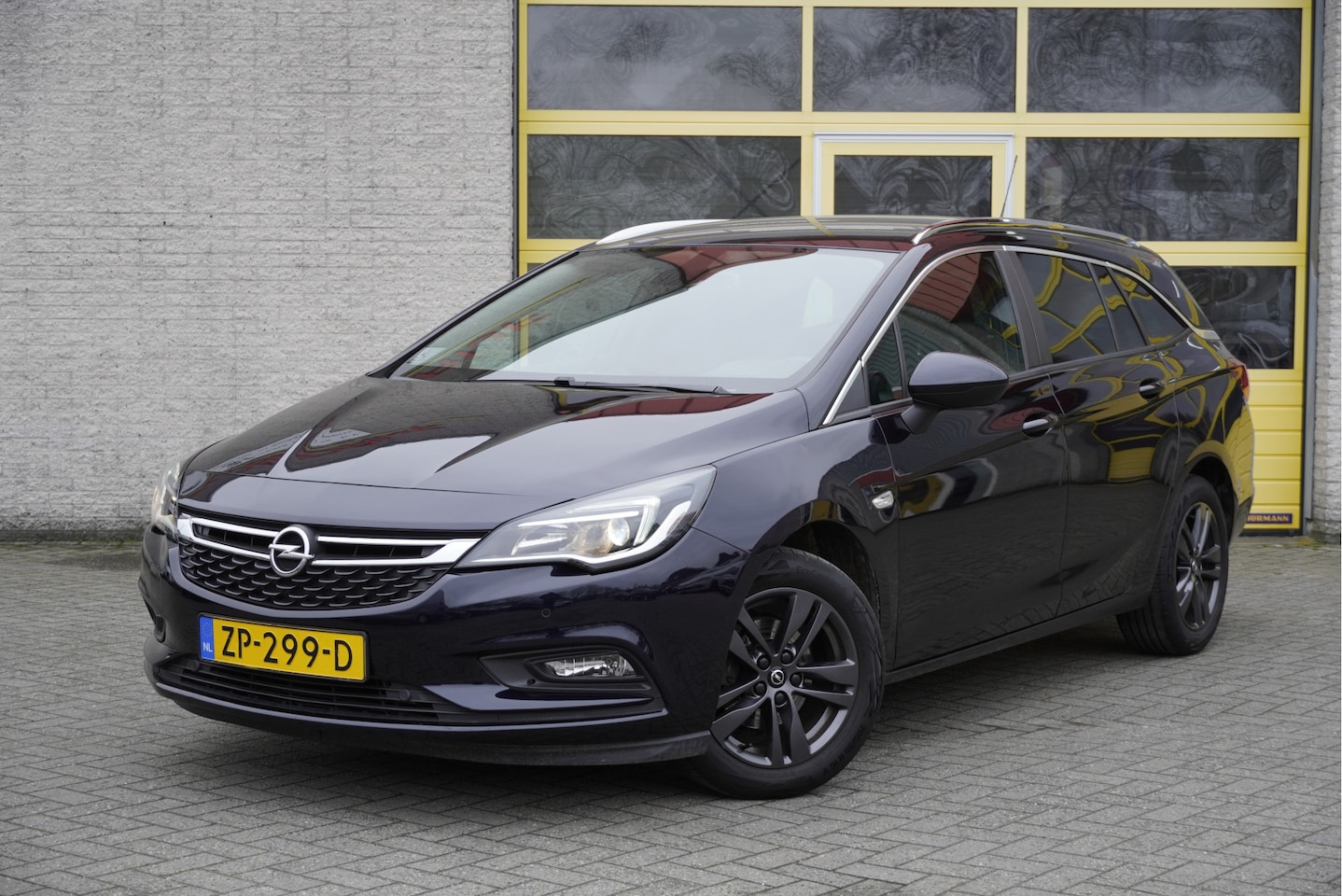 Opel Astra Sports Tourer - 1.0 Turbo 120 Jaar Edition BJ2019 Lmv 16" (Zwart) | Led | Pdc | Navi | Climate control | C - AutoWereld.nl