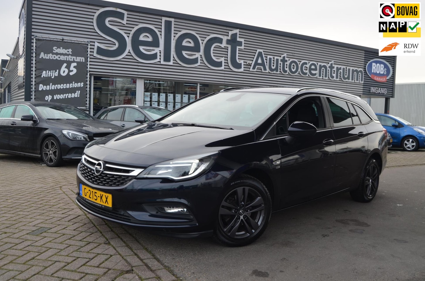 Opel Astra Sports Tourer - 1.0 Turbo 120 Jaar Edition|SPORTSTOELEN|NAVI|CARPLAY|1E EIGENAAR|BOEKJES - AutoWereld.nl