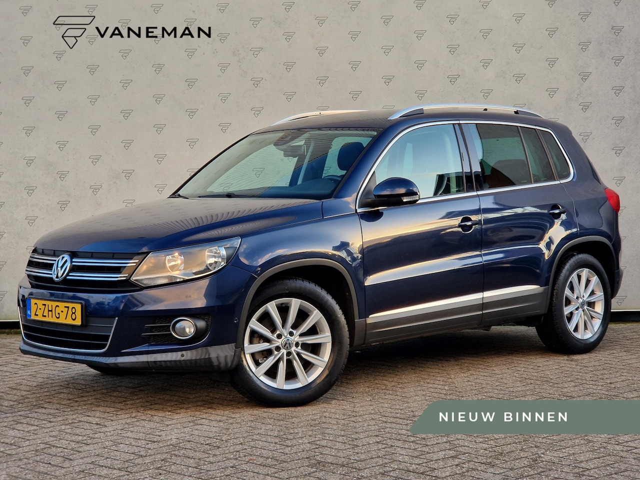 Volkswagen Tiguan - 1.4 TSI Sport&Style | Clima | Cruise | Trekhaak | PDC | - AutoWereld.nl