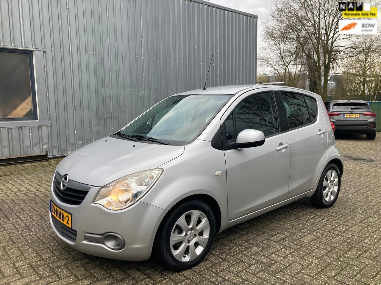 Opel Agila - 1.2 Enjoy / 5drs / Trekhaak / Airco - AutoWereld.nl