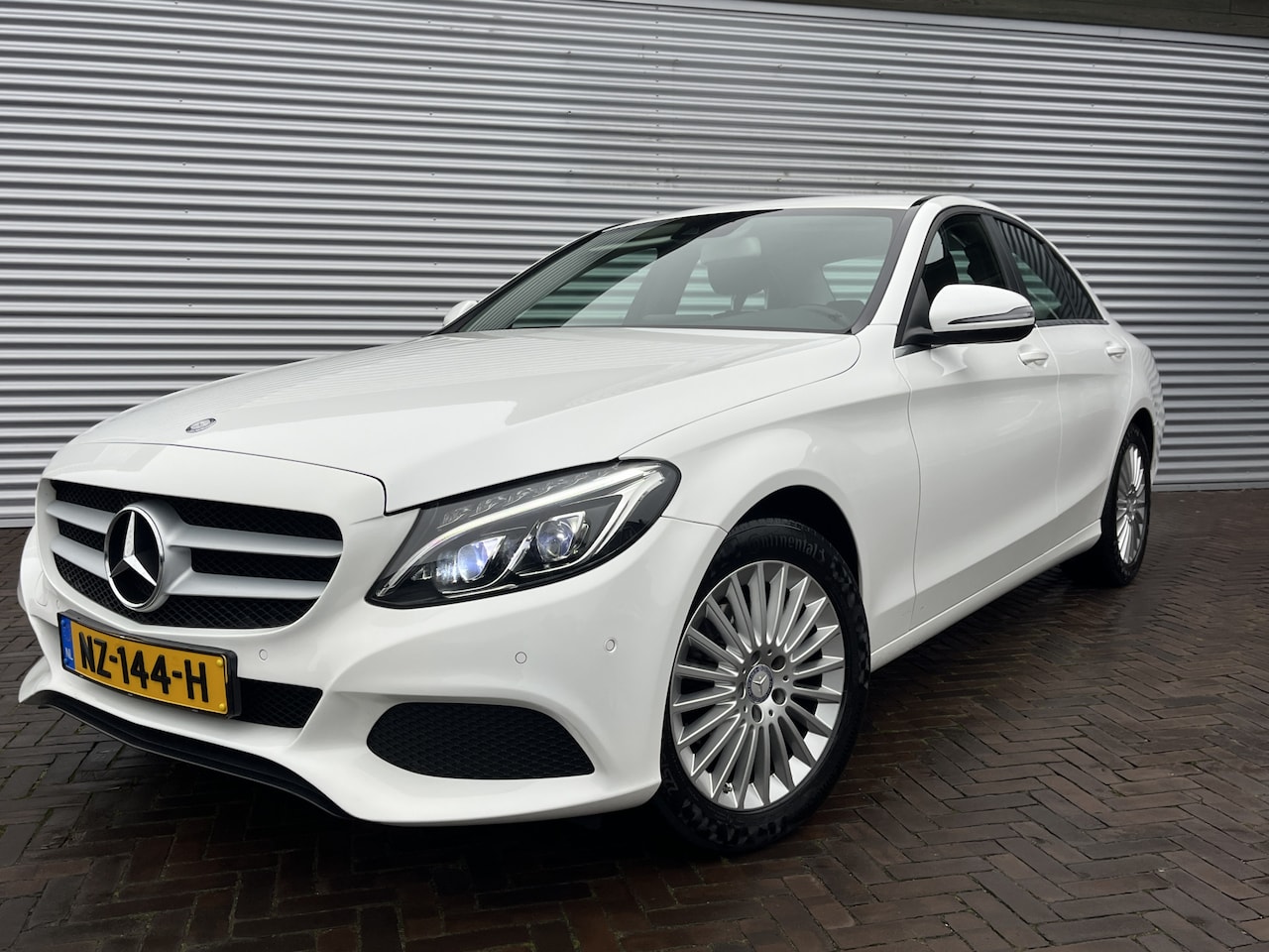 Mercedes-Benz C-klasse - 180 Prestige LAGE KM - AutoWereld.nl