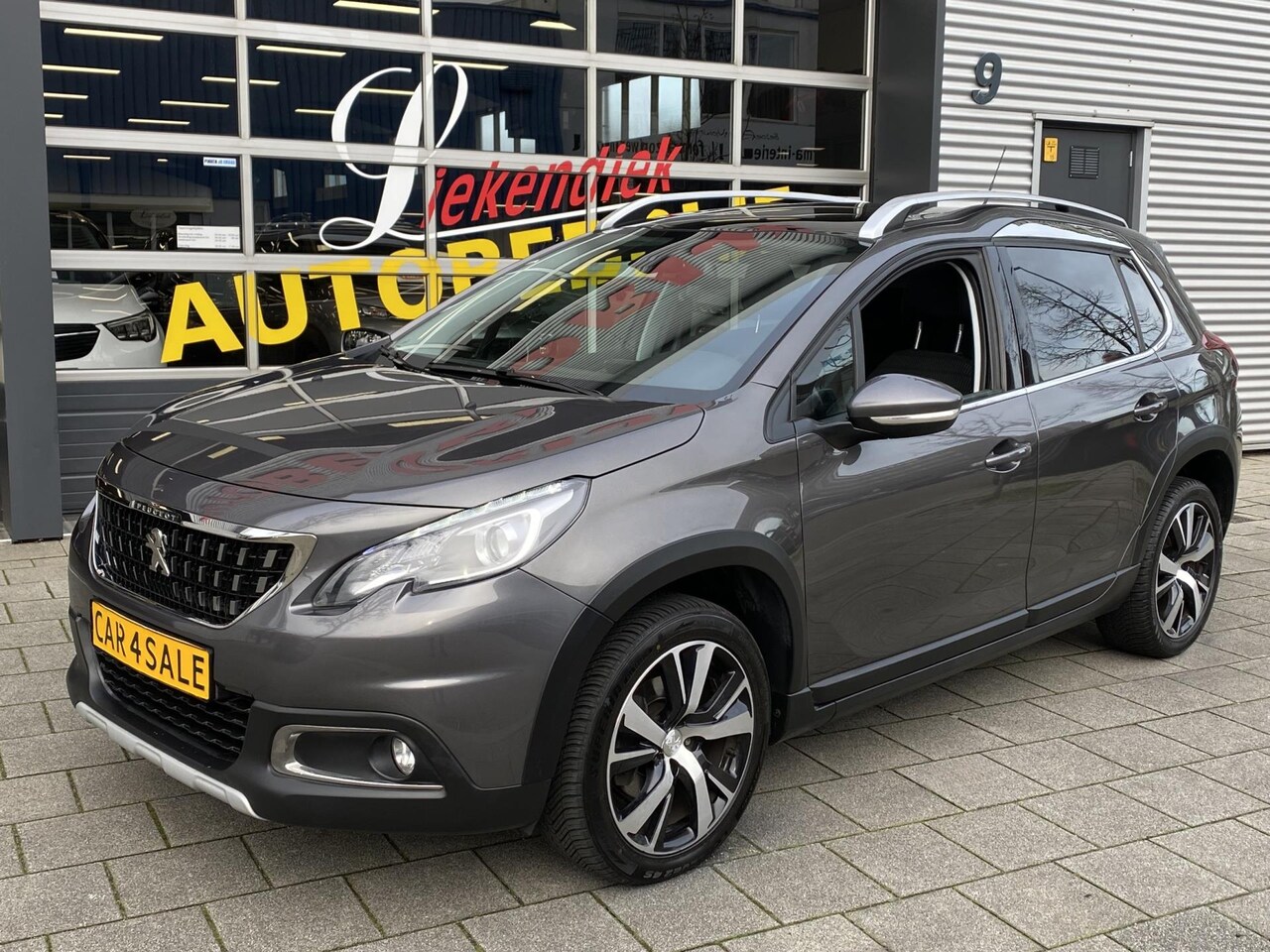 Peugeot 2008 - 1.2 PureTech Allure - Panorama dak I Navigatie I LED/Xenon I PDC /Camera I Airco I Sport v - AutoWereld.nl