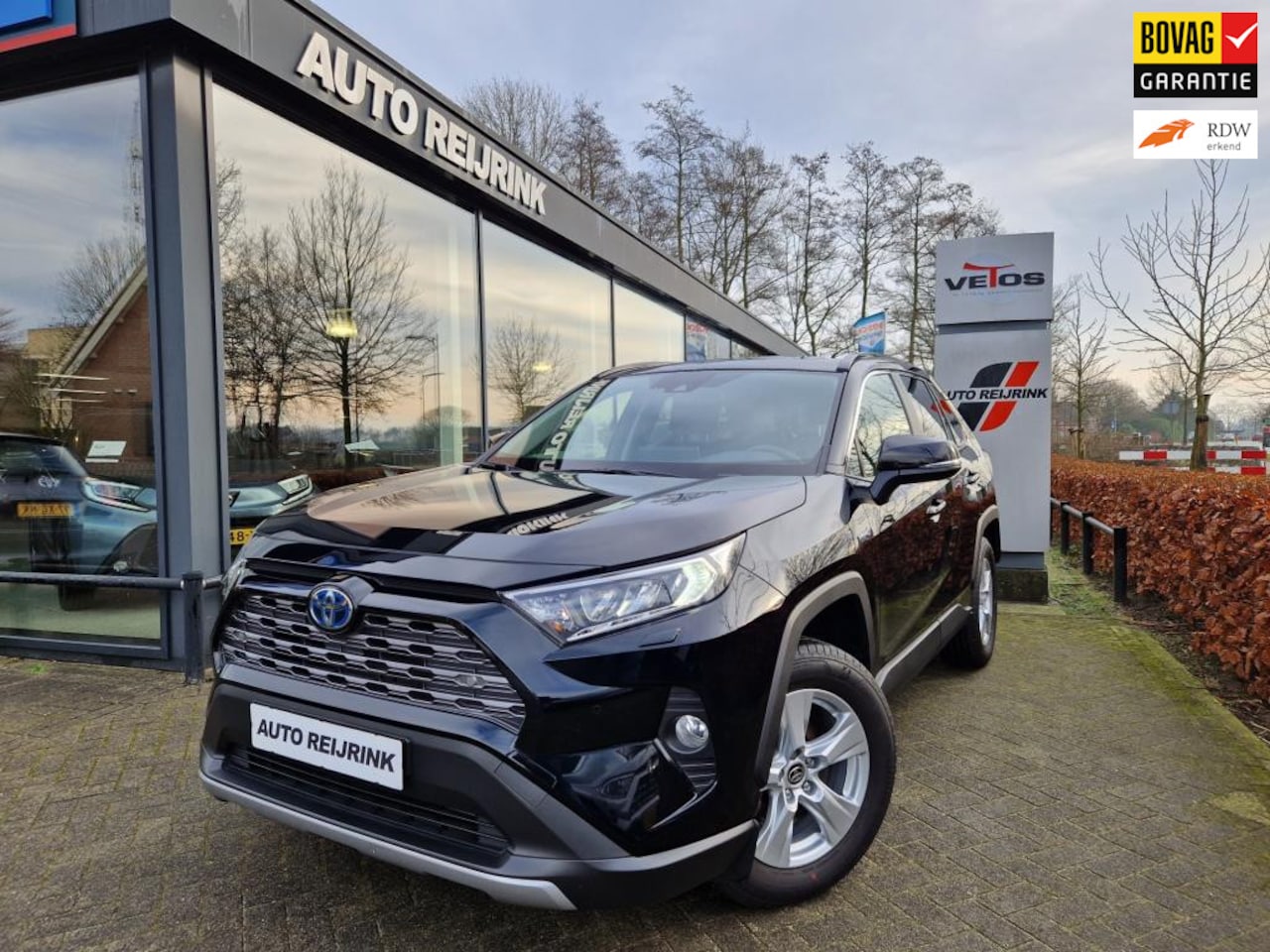 Toyota RAV4 - 2.5 Hybrid Active Comfort/LEDER/KEYLESS/STOEL-EN STUURVERWARMING/ELECTR A-KLEP+WINTERBANDE - AutoWereld.nl