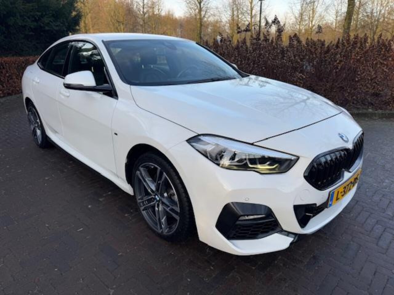 BMW 2-serie Gran Coupé - 218i BUSINESS EDITION PLUS/M-PAKKET/LED/LEER/NAV/ACARPLAY - AutoWereld.nl