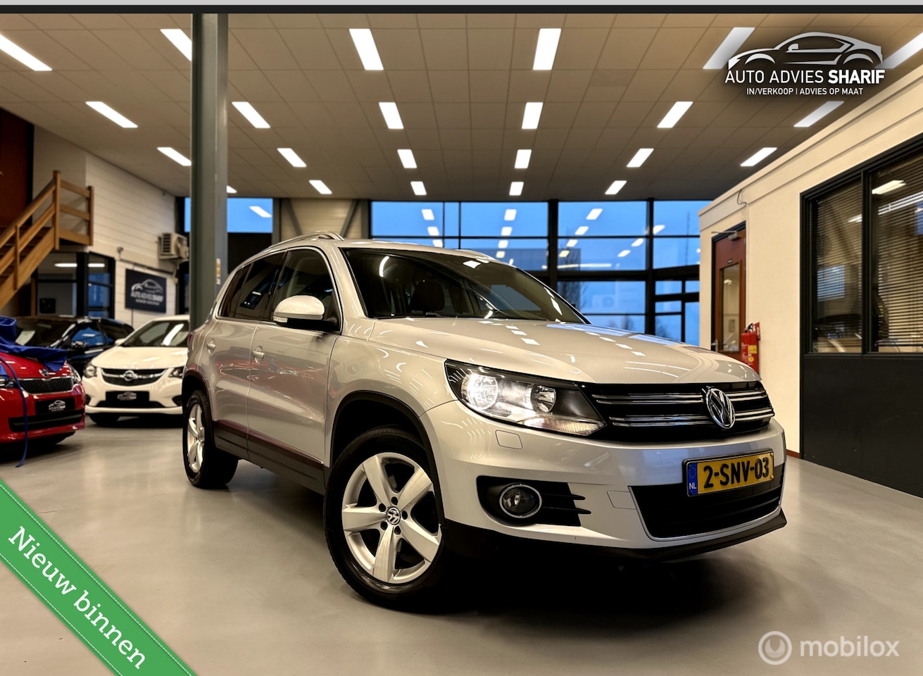 Volkswagen Tiguan - 1.4 TSI Sport&Style R-line|CarPlay|Trekhaa - AutoWereld.nl