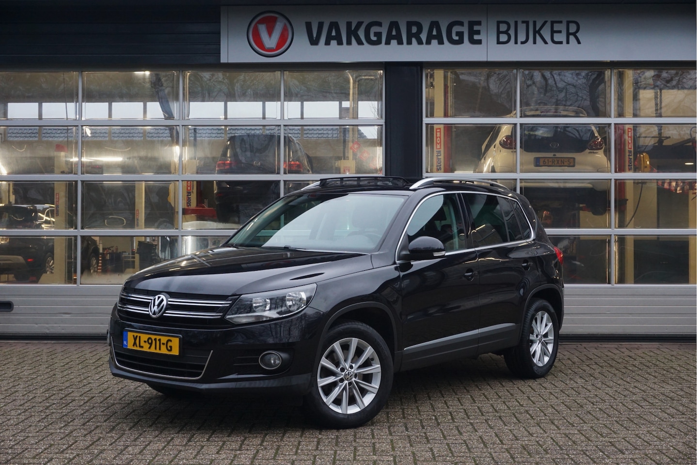 Volkswagen Tiguan - 1.4 TSI Sport&Style met trekhaak! - AutoWereld.nl