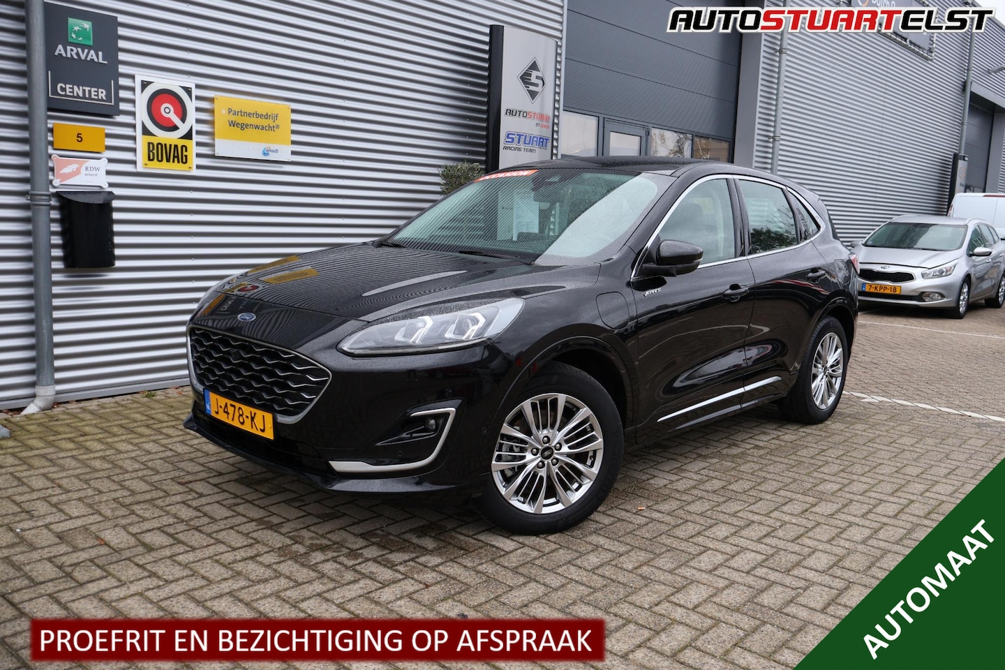 Ford Kuga - 2.5 PHEV Vignale Lederen bekleding | Stoelverwarming | Climate Control | Parkeersensoren+C - AutoWereld.nl