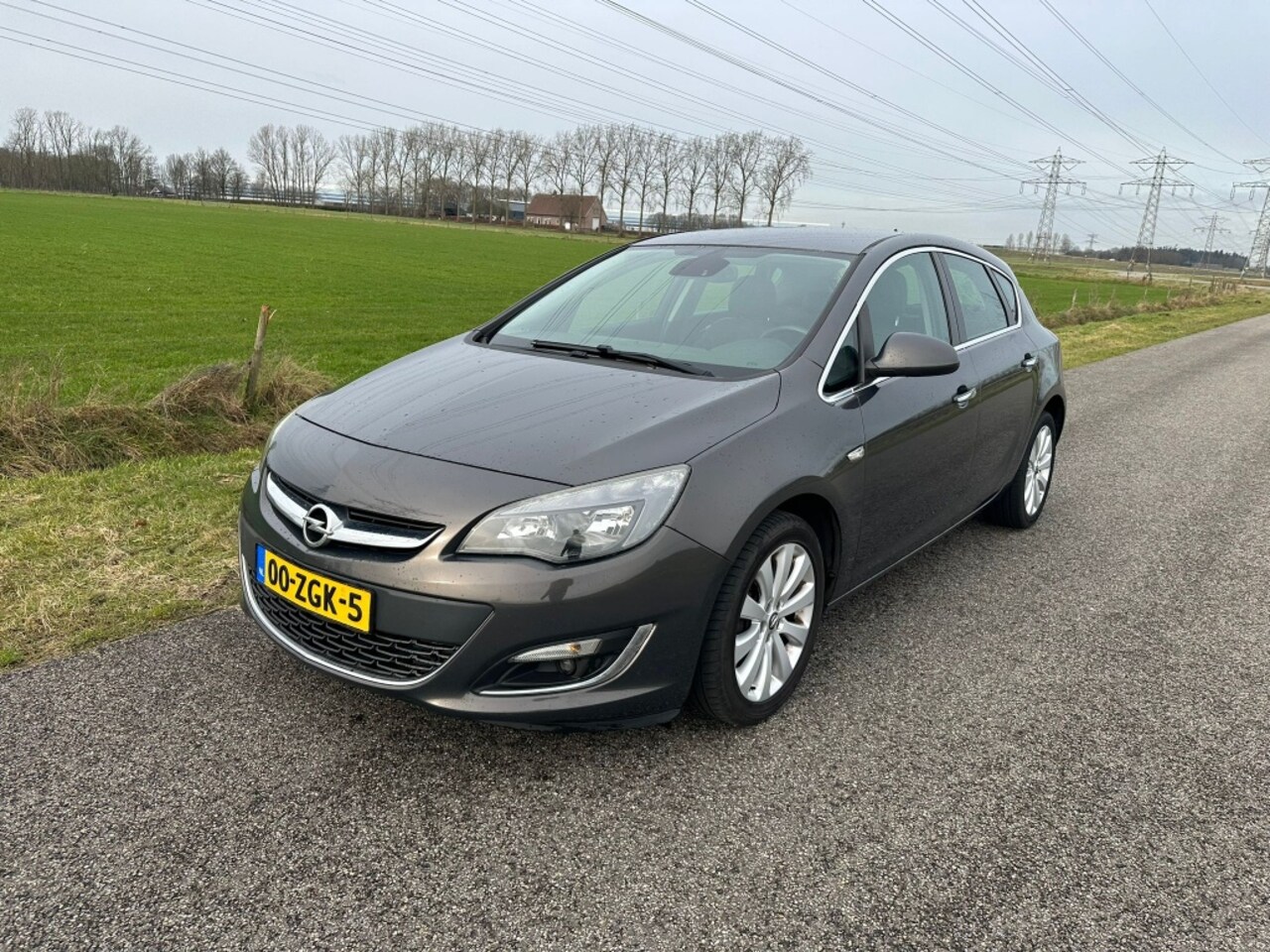 Opel Astra - 1.4 Turbo Cosmo AIRCO / ONDERHOUDSBOEKJE / NAP ! - AutoWereld.nl