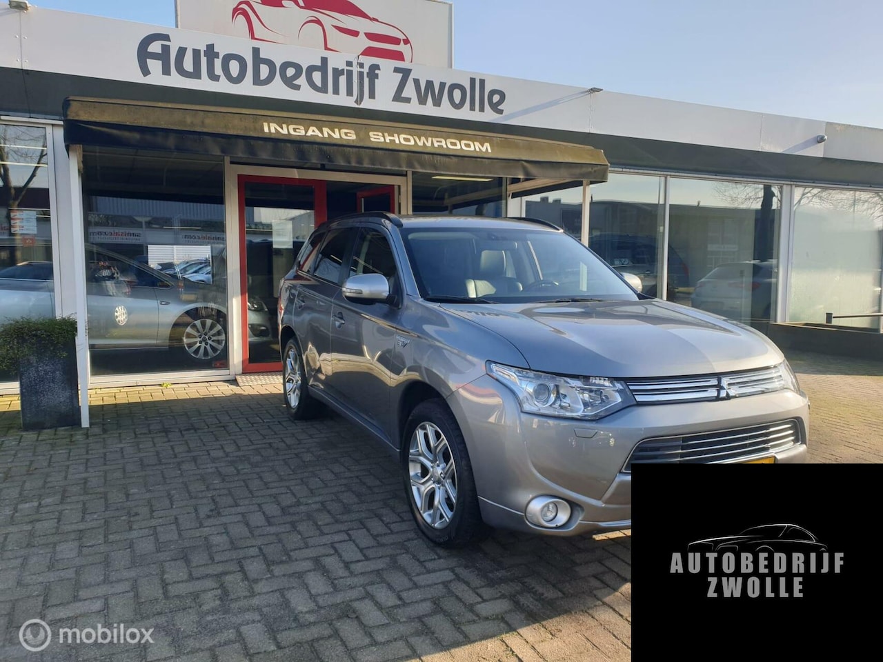 Mitsubishi Outlander - 2.0 PHEV AUTOMAAT *AIRCO *NAVI *CRUISE* - AutoWereld.nl