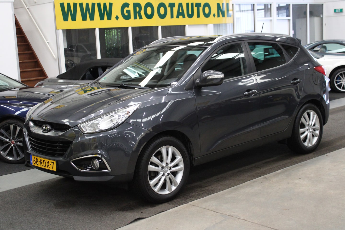 Hyundai ix35 - 2.0i i-Catcher Automaat Panoramadak, Airco, Cruise Control, Trekhaak, Navigatie, Stuurbekr - AutoWereld.nl