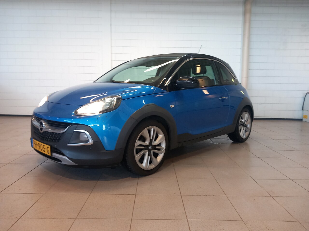 Opel ADAM - 1.0 Turbo Rocks Online Edition | Schuifdak | Full map navigatie | Climate control | Cruise - AutoWereld.nl