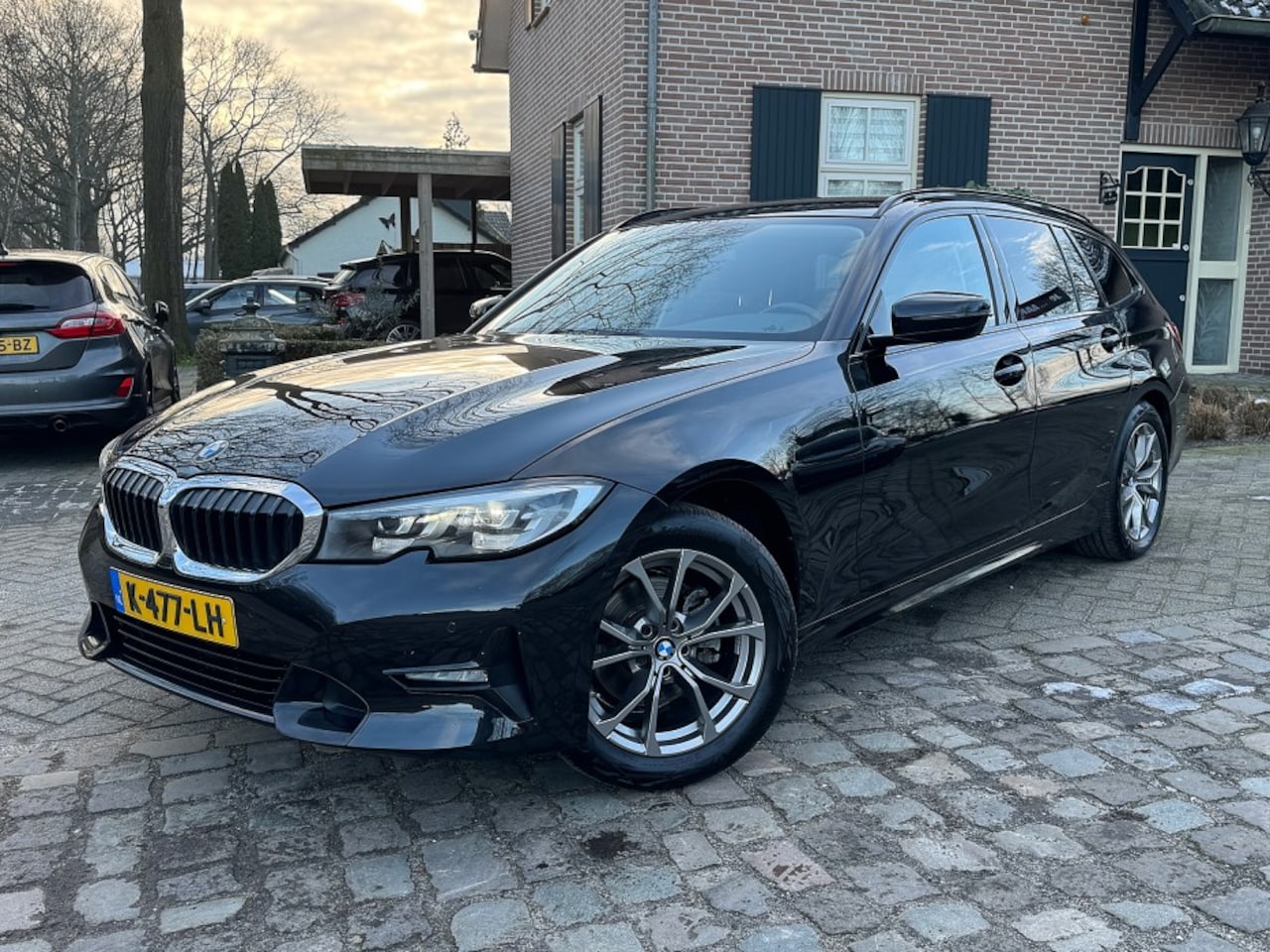 BMW 3-serie Touring - 320 autom Exe Ed ecc,1/2leer,lmv,led,navi,trekhaak - AutoWereld.nl