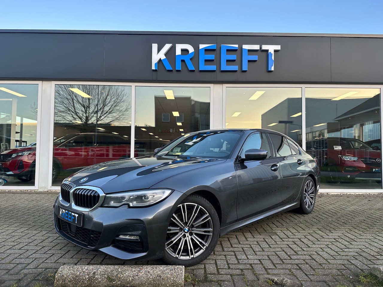 BMW 3-serie - 320i High Executive M Sport - AutoWereld.nl