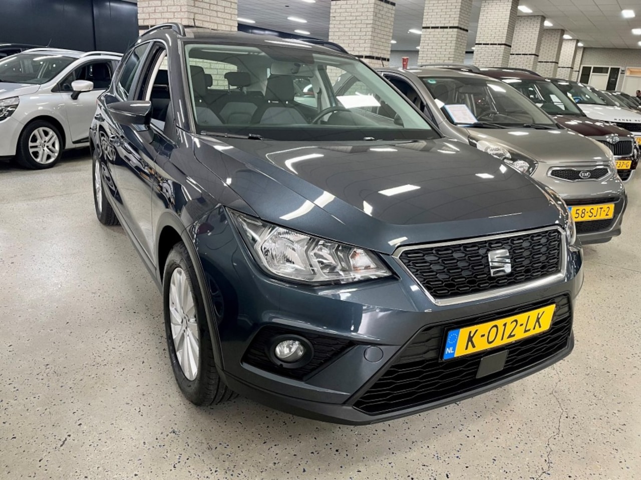 Seat Arona - TSI Airco / Cruise / Apple carplay / PDC / Dab NAP - AutoWereld.nl