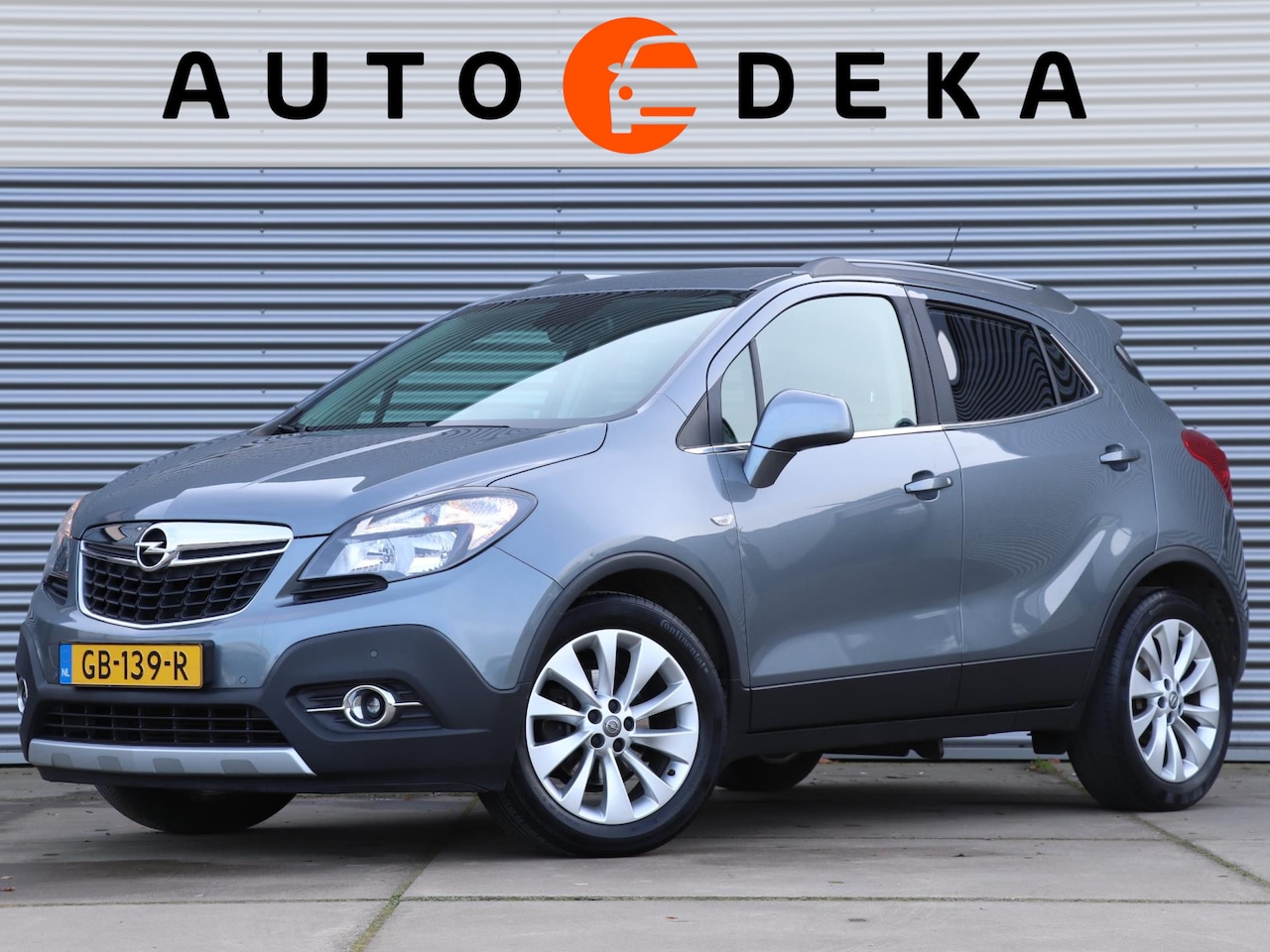 Opel Mokka - 1.4 Turbo Cosmo Automaat *1e Eigenaar*Navigatie*Trekhaak* - AutoWereld.nl