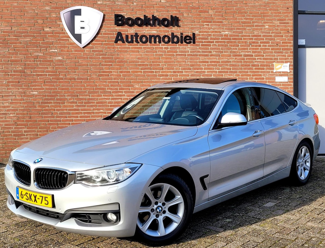 BMW 3-serie Gran Turismo - 320i Panoramadak, Winterset, Trekhaak, High Executive - AutoWereld.nl