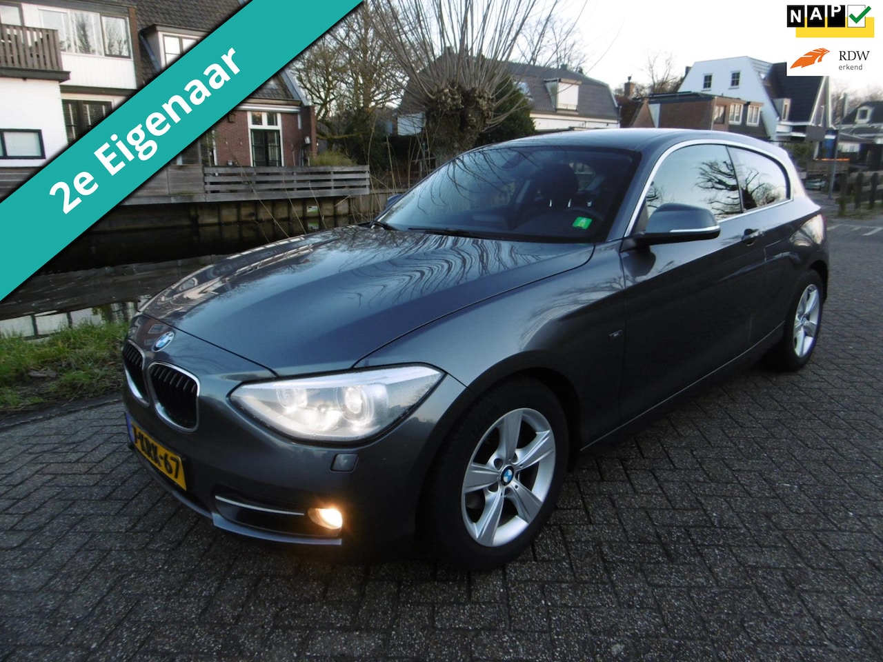 BMW 1-serie - 116i EDE Exe 136pk Clima Navi PDC Xenon 2e eigenaar - AutoWereld.nl