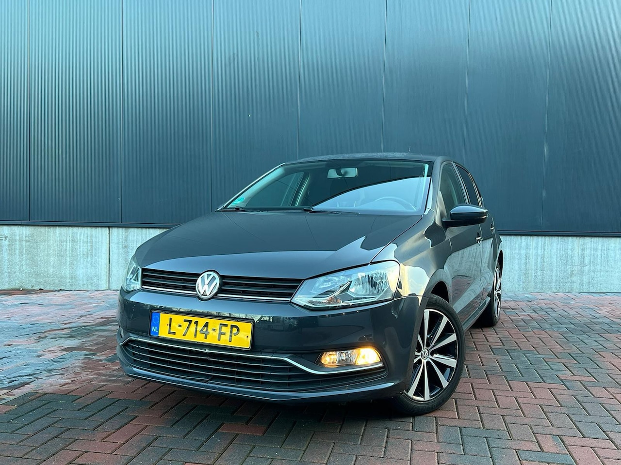 Volkswagen Polo - 1.2 TSI Comfortline * Automaat * Airco * Goed Onderhouden - AutoWereld.nl