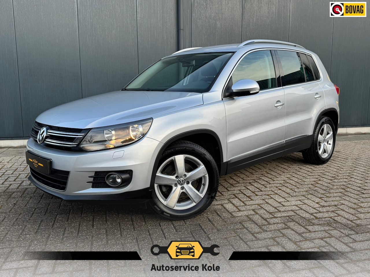 Volkswagen Tiguan - 1.4 TSI Sport&Style * Stoel verw * Navi * Cruise * Pdc a * - AutoWereld.nl