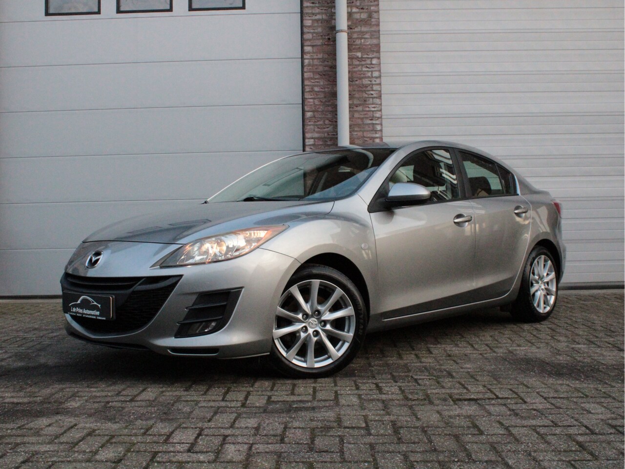 Mazda 3 - 2.0 DiSi TS Plus N.A.P/Volledig dealer onderhouden/Trekhaak/Garantie - AutoWereld.nl