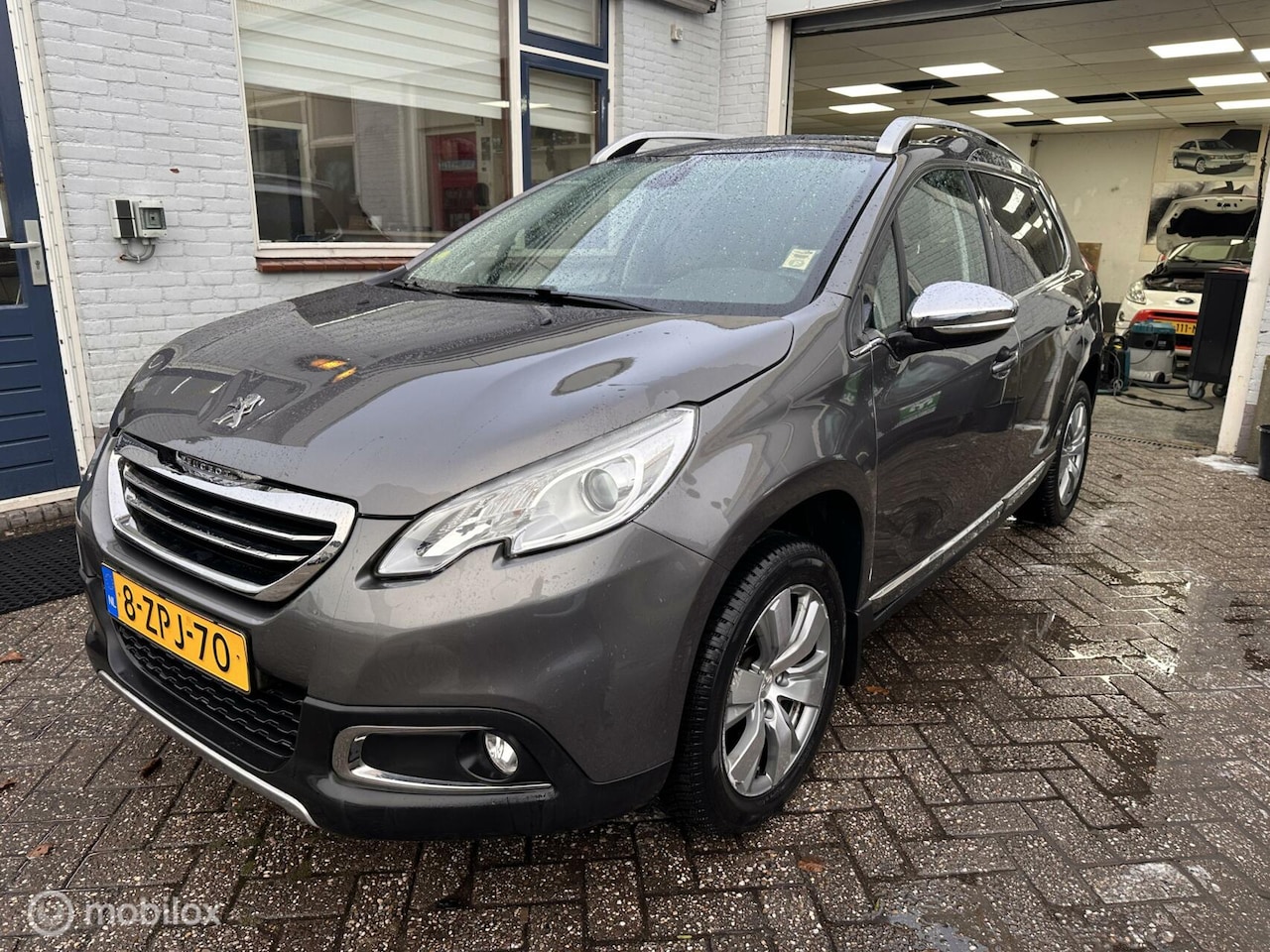 Peugeot 2008 - 1.6 e-HDi Allure 1.6 e-HDi Allure - AutoWereld.nl