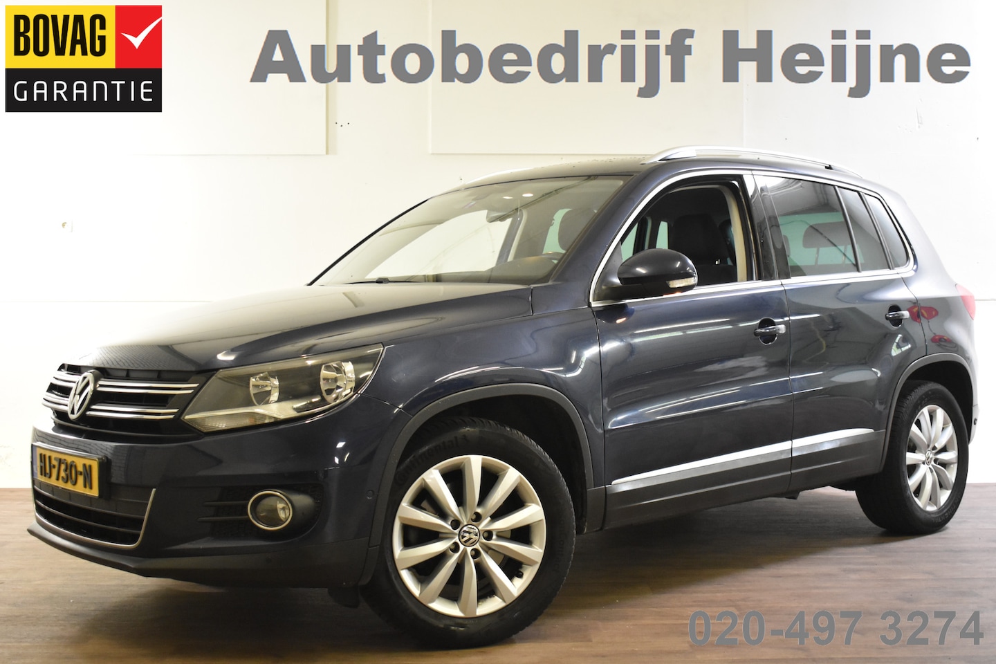 Volkswagen Tiguan - 1.4 TSI 125PK SPORT&STYLE NAVI/PDC/ALCANTARA - AutoWereld.nl