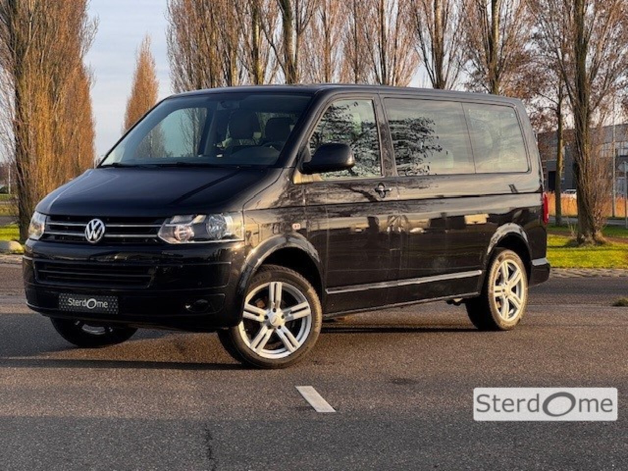 Volkswagen Transporter Kombi - 2.0 TDI L1H1 Comfortline l Personenbus l 9 Persoons l Caravelle l Airco l Parkeersensoren - AutoWereld.nl