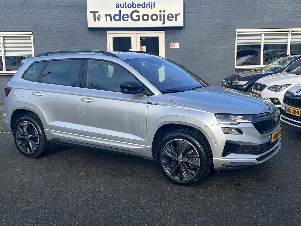 Skoda Karoq - 1.5 TSi ACT DSG Sportline Business | 5 JAAR FABRIEKSGARANTIE! | - AutoWereld.nl