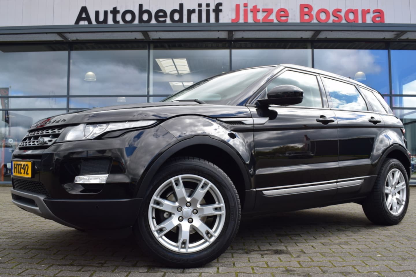 Land Rover Range Rover Evoque - 2.0 Si Automaat 4WD Dynamic Zwart Leder | Panoramadak | Meridian Audio | Full Map Navi | A - AutoWereld.nl